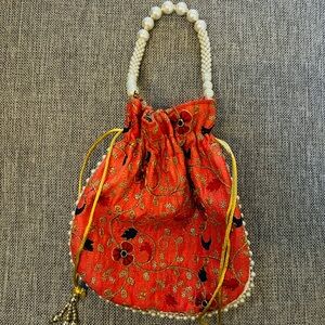 Beautiful Red Drawstring Bag with Pearl Handle